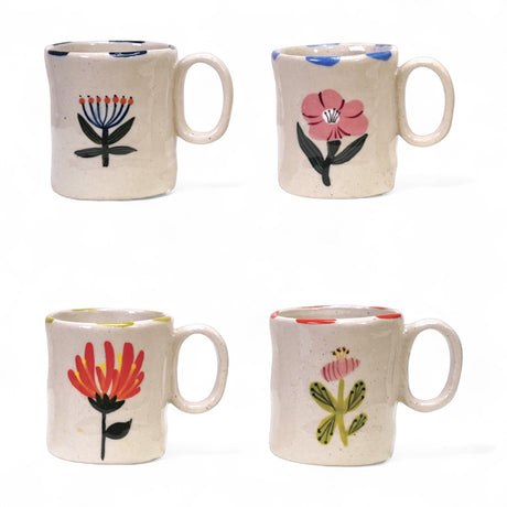 Hand-painted stoneware child mug with floral design, 5 oz, 4 styles.