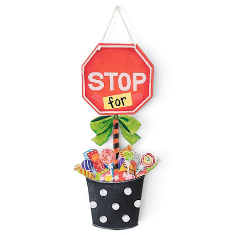 Stop For Candy Halloween door hanger with red stop sign, green bow, and colorful candy bucket