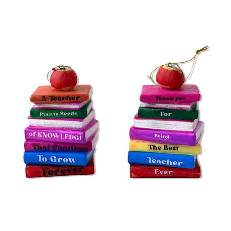 Glass teacher ornament shaped like stacked books with apple on top