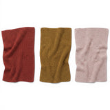 Textured cotton knit tea towels in rust, mustard, and oatmeal