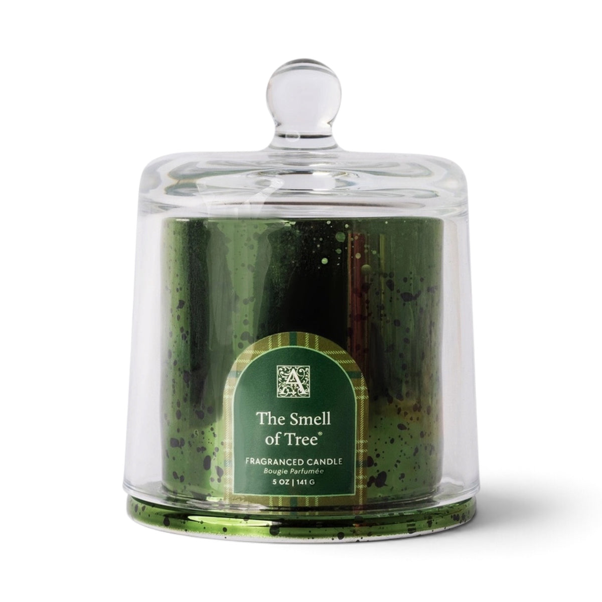 The Smell of Tree 5 oz candle in a speckled green metallic glass vessel with a green plaid label and clear glass cloche lid