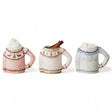 Stoneware sweater shaped mugs in three festive styles