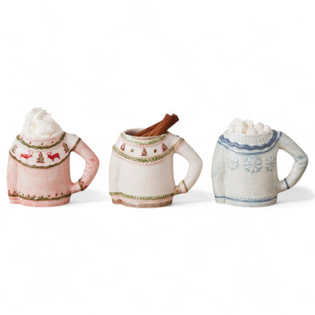 Stoneware sweater shaped mugs in three festive styles