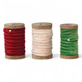 velvet ribbon in red, ivory, and green