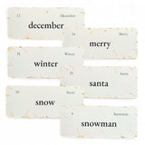 Set of Christmas-themed flashcards with text on a white background