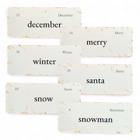 Set of Christmas-themed flashcards with text on a white background