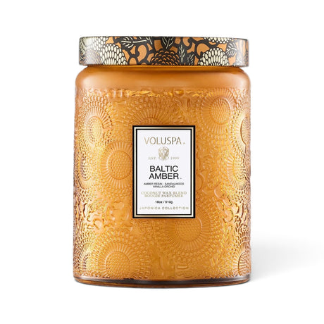 Voluspa Baltic Amber 18 oz large jar candle in embossed amber glass with decorative metal lid