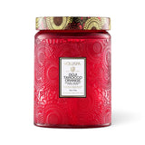 Voluspa Goji Tarocco Orange 18 oz large jar candle in embossed red glass with decorative metal lid