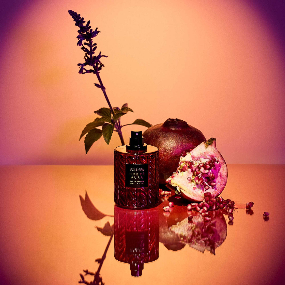 Ombre Aura fragrance notes with pomegranate patchouli cashmere wood leather and warm amber