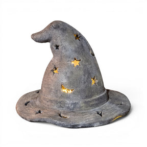 Weathered black cement witch hat Halloween luminary with star and moon cutouts