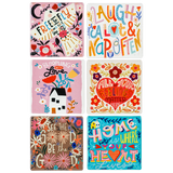 Colorful ceramic fridge magnets with inspirational messages and floral designs.