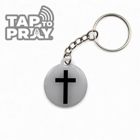 white and black cross tap to pray bible verse keychain