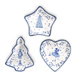 White and blue shaped ceramic dishes featuring holiday images in three styles.