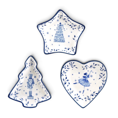 White and blue shaped ceramic dishes featuring holiday images in three styles.