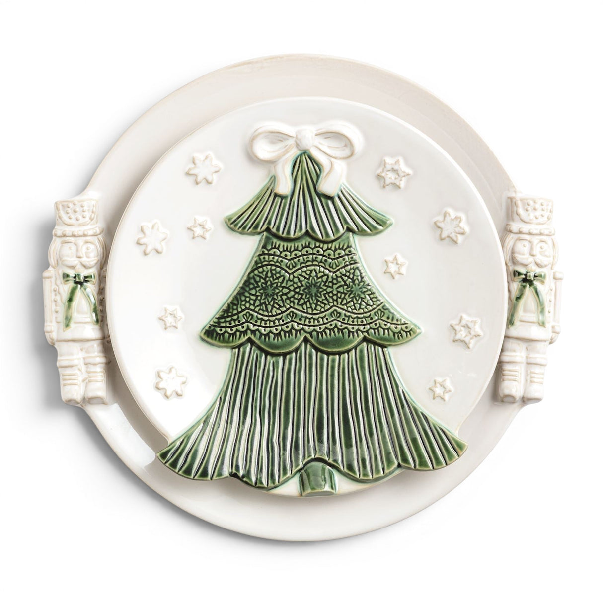 White Christmas ceramic platter set with raised green tree design and sculpted nutcracker handles