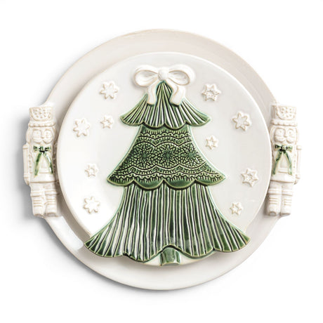 White Christmas ceramic platter set with raised green tree design and sculpted nutcracker handles