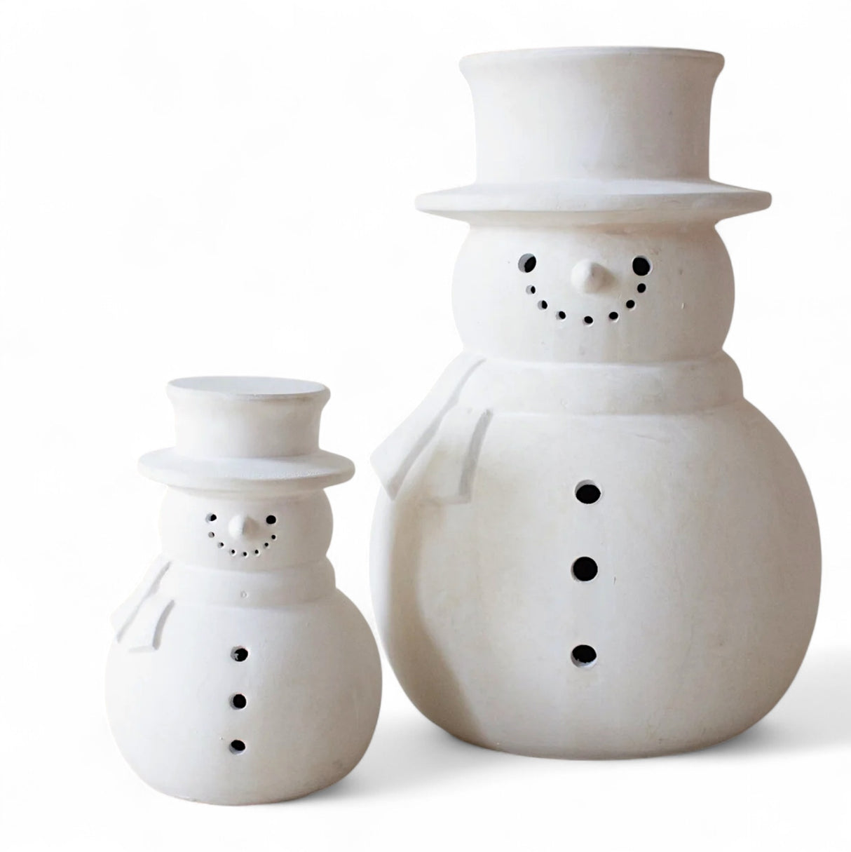 White terracotta snowman décor in two sizes, handcrafted with cut-out details and matte finish