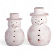 White-washed terracotta snowman luminaries in two sizes with pierced holes for flameless tea lights