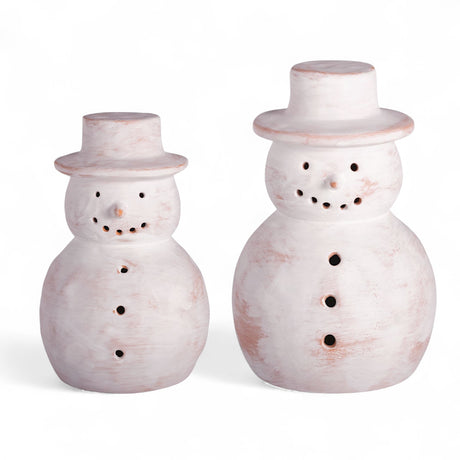 White-washed terracotta snowman luminaries in two sizes with pierced holes for flameless tea lights