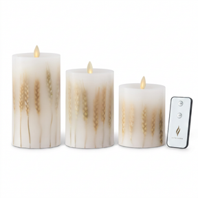 White wax Luminara flameless pillar candles with embedded wheat in three sizes and remote control