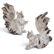 Whitewashed resin sitting squirrel figurines in two poses with detailed fur and large textured tails