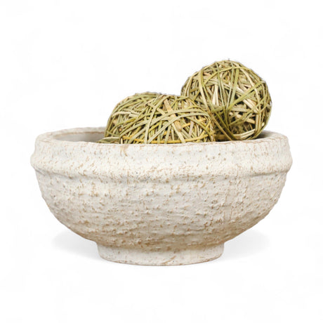 Whitewashed textured terra cotta bowl used for decorative styling or holding fruit