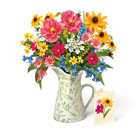 Wildflower Meadow pop-up paper bouquet with daisies, poppies, black-eyed Susans, Queen Anne’s lace, and bumblebees in a pitcher vase
