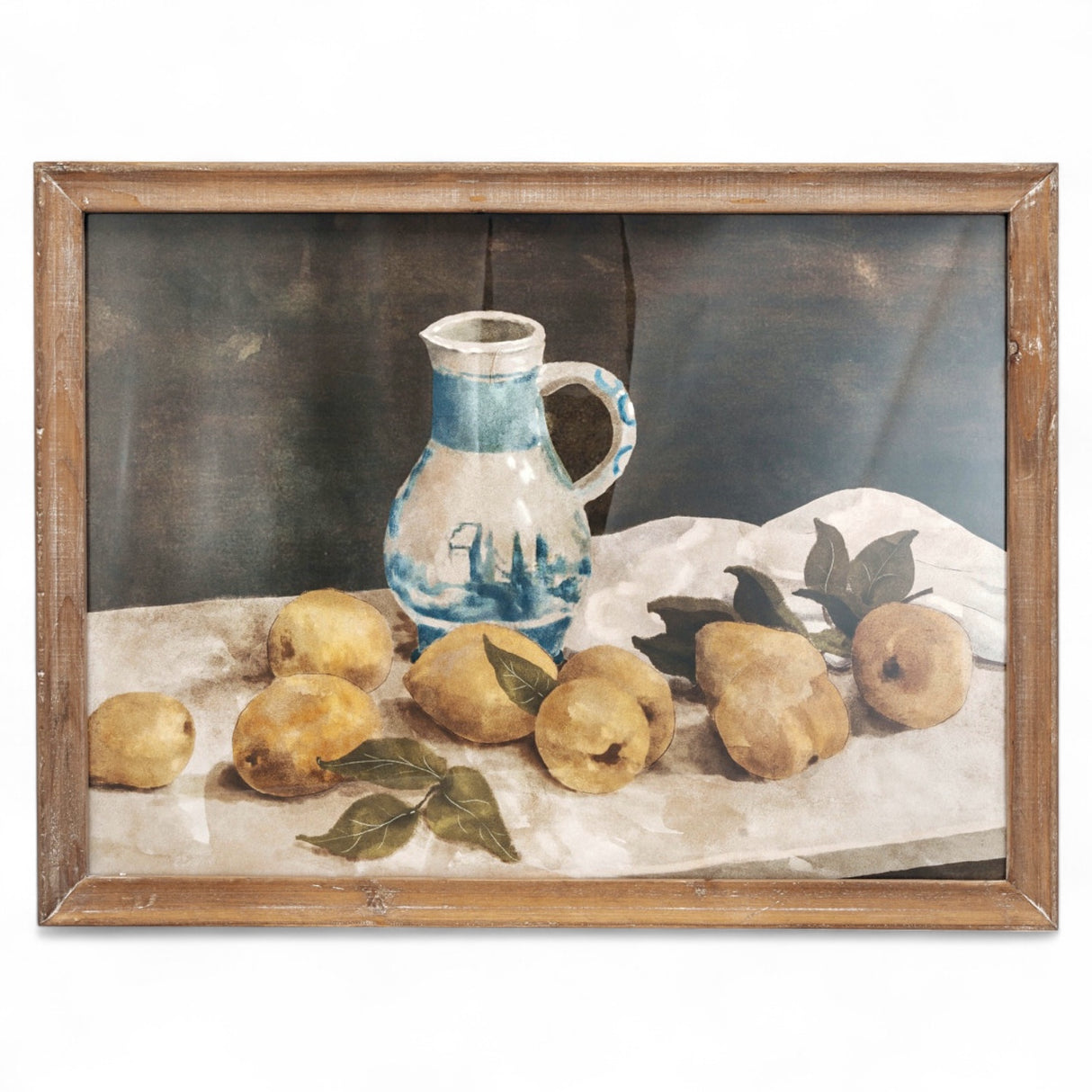 Rustic wood framed glass wall art featuring a still life of lemons and a blue pitcher, measuring 23.5 inches by 17.75 inches.