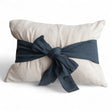 Natural and navy woven cotton lumbar pillow with bow